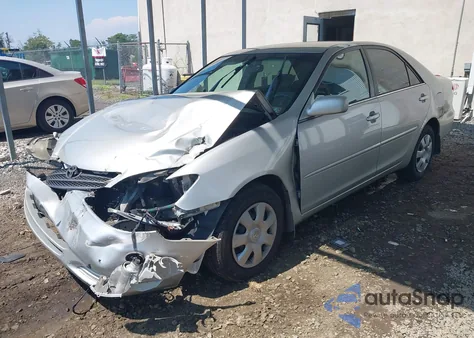 2003 Toyota Camry Le from USA, damaged, VIN 4T1BE32K23U134687